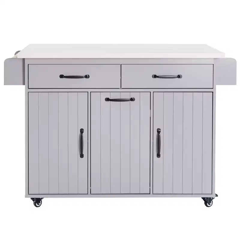Isla de cocina con armario para guardar el cubo de basura y estante ajustable, carrito de cocina con ruedas y ala abatible, toallero y cajón