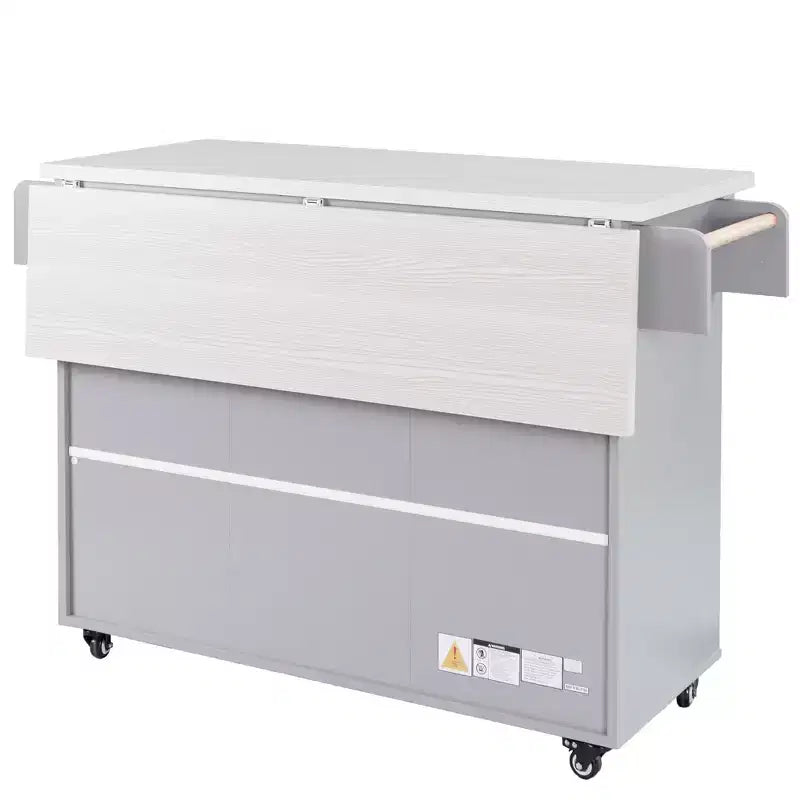 Isla de cocina con armario para guardar el cubo de basura y estante ajustable, carrito de cocina con ruedas y ala abatible, toallero y cajón