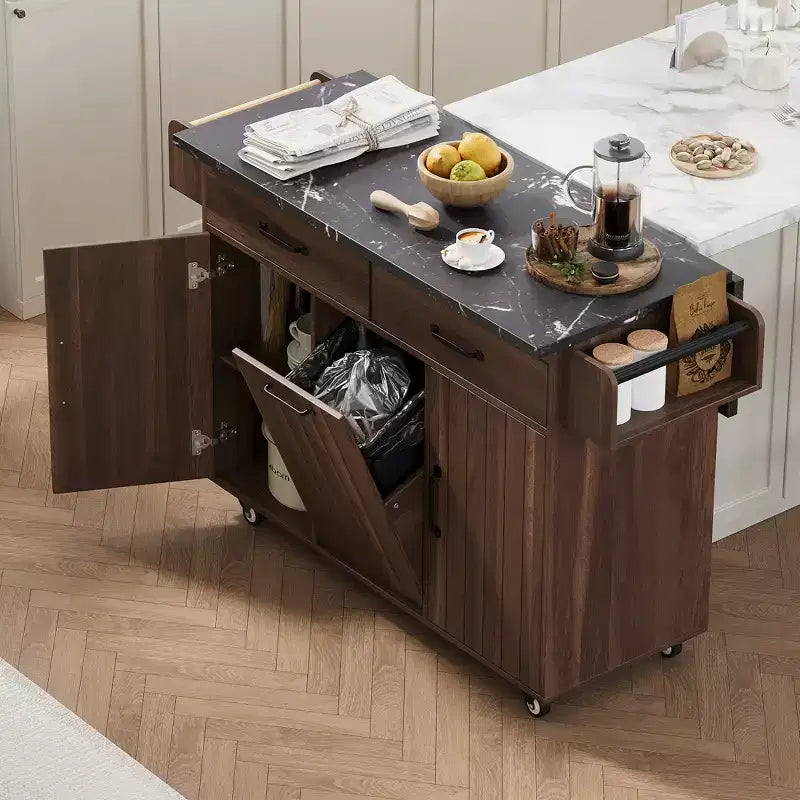 Isla de cocina con armario para guardar el cubo de basura y estante ajustable, carrito de cocina con ruedas y ala abatible, toallero y cajón