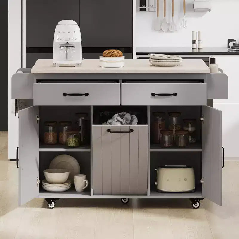 Isla de cocina con armario para guardar el cubo de basura y estante ajustable, carrito de cocina con ruedas y ala abatible, toallero y cajón
