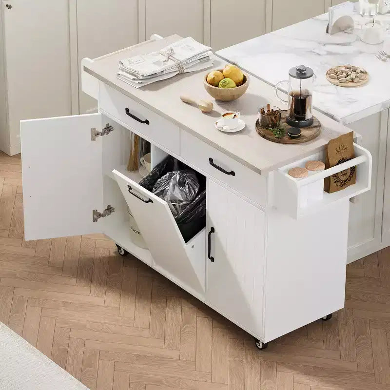 Isla de cocina con armario para guardar el cubo de basura y estante ajustable, carrito de cocina con ruedas y ala abatible, toallero y cajón